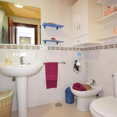 Playa De Quenxe Апартаменты Коркубион